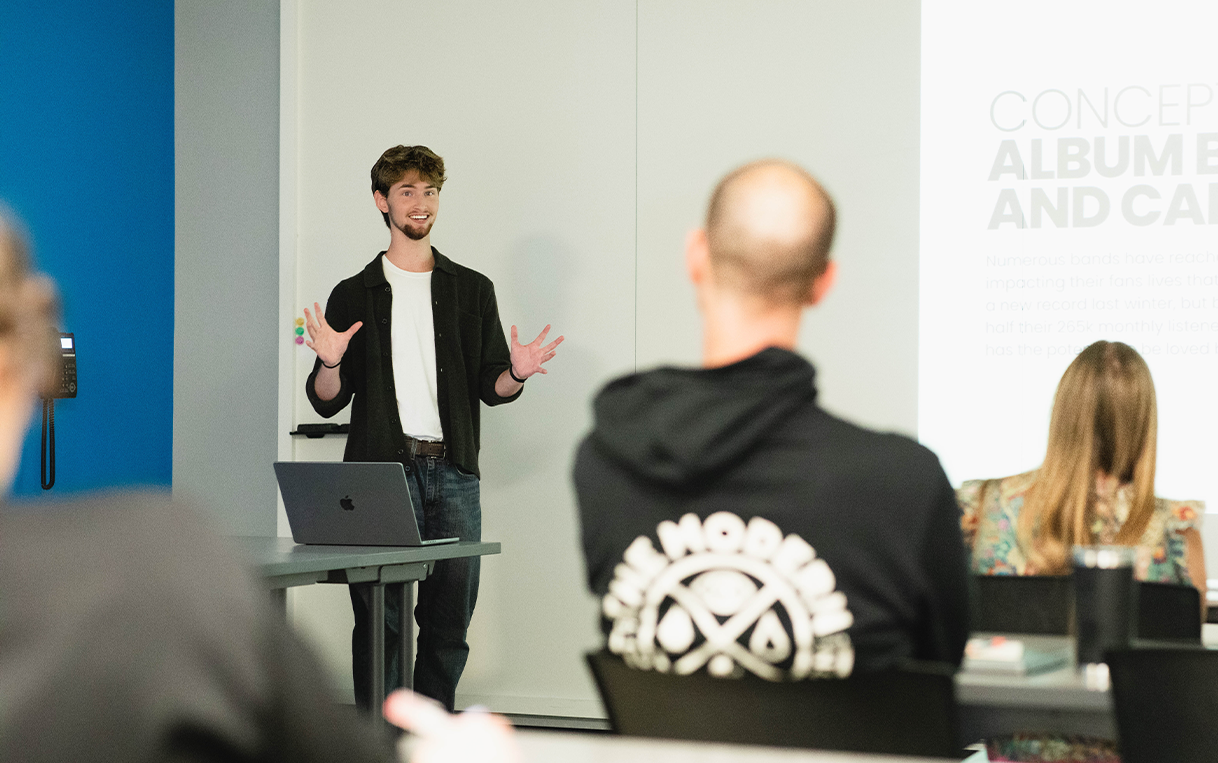Students presenting their portfolio pitches.