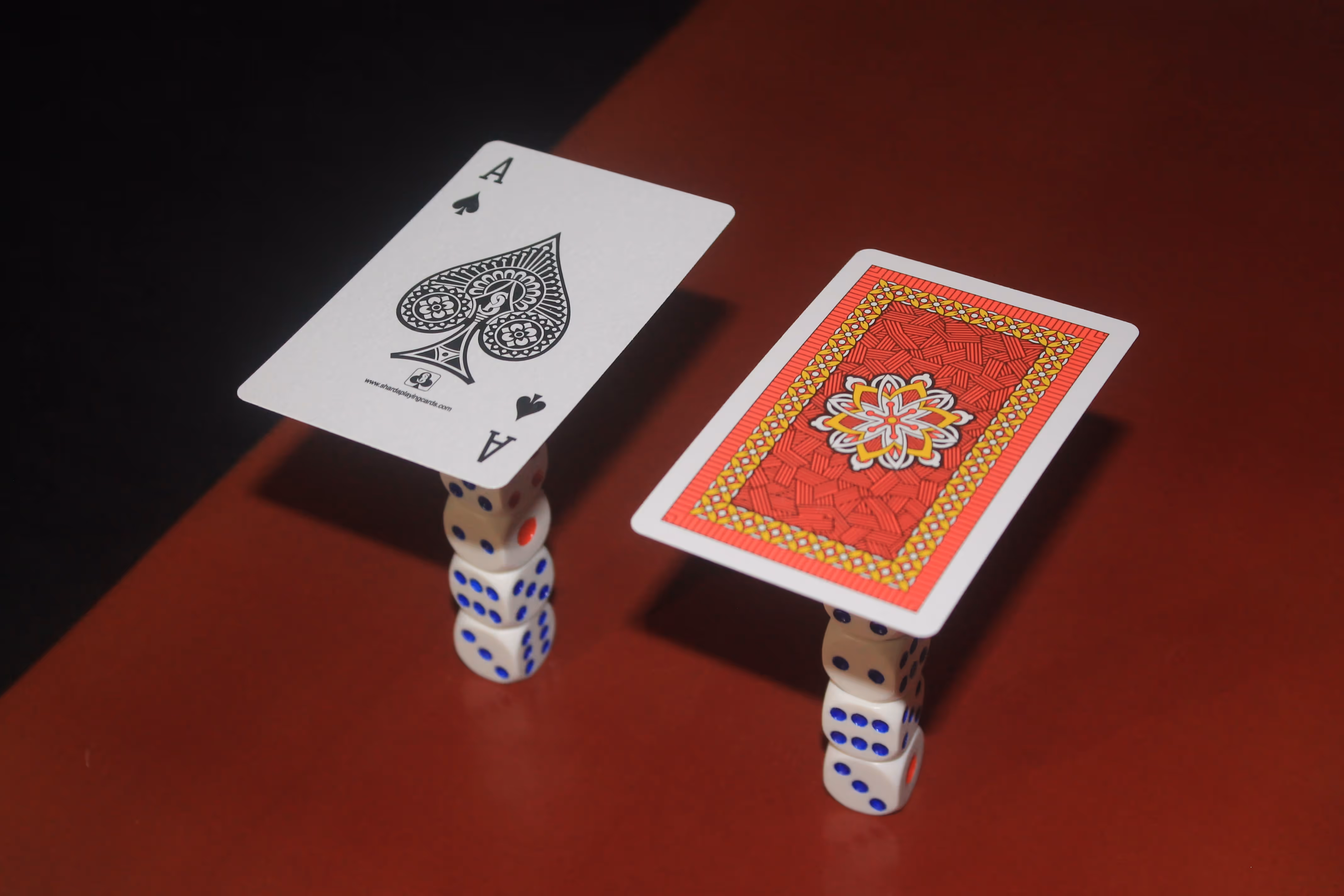 Captivating Mood shot of Wiski Brandi Playing Cards on sets of dice.