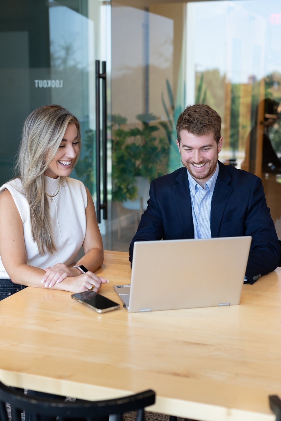Business owner analyzing operational workflow and performance metrics to identify inefficiencies affecting scalability in Richardson, Texas