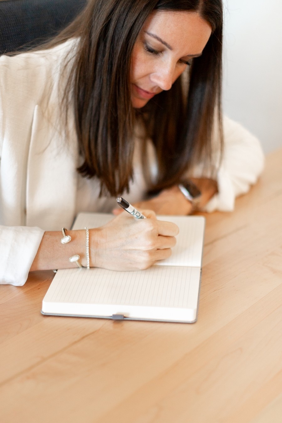 Healthcare consultant reviewing financial data with a medical practice team to improve profitability and growth