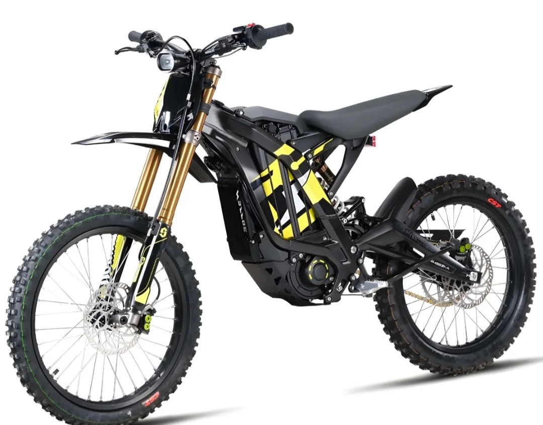 Black and yellow electric dirt bike with knobby tires and gold front suspension forks on white background.