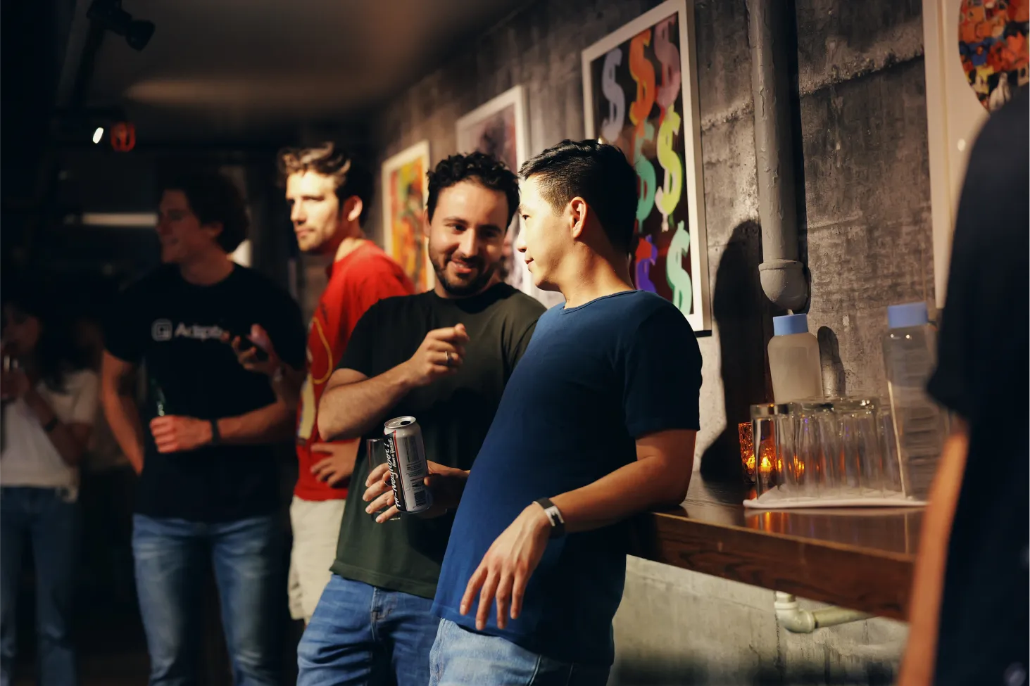 two people talking in a night club environment