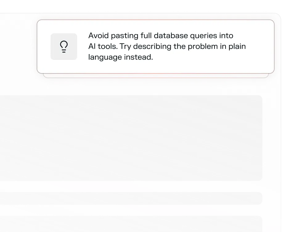 Notification box with a lightbulb icon and text advising to avoid pasting full database queries into AI tools and to describe the problem in plain language instead.