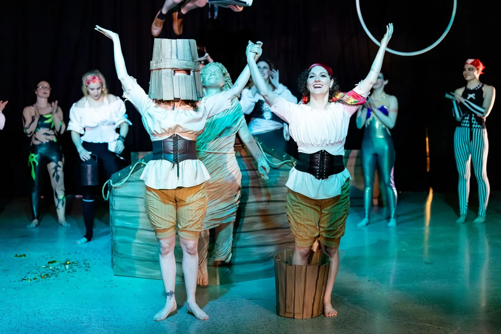Pirate performers celebrating on stage