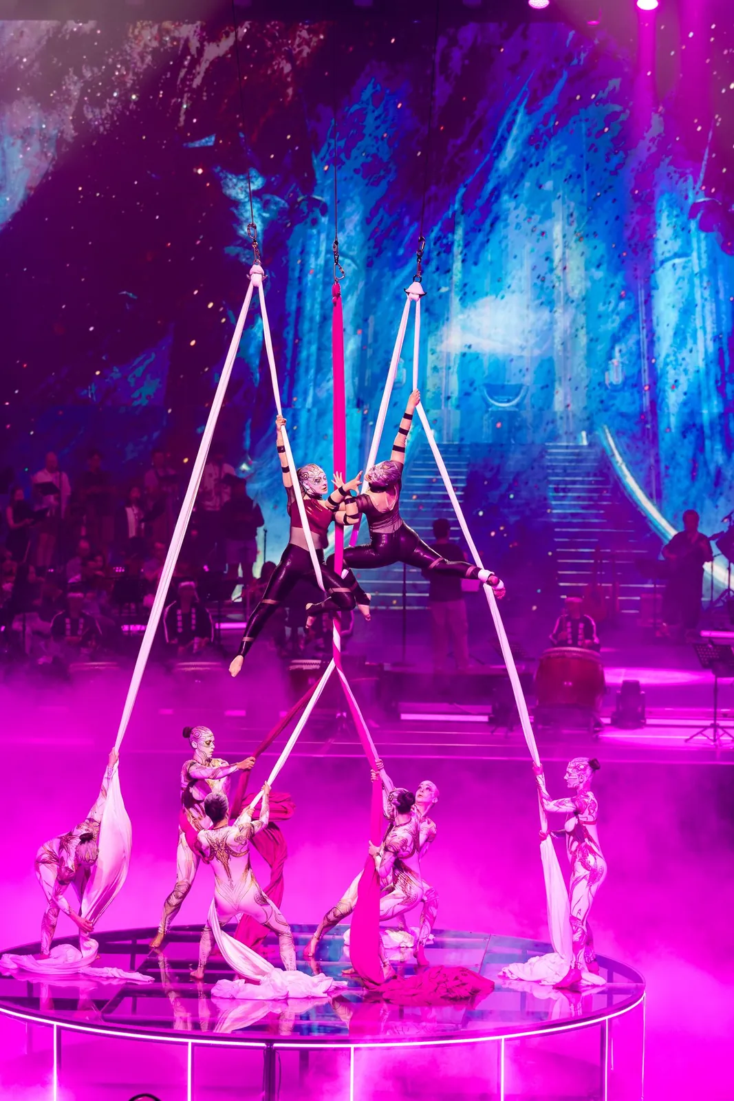 Silks tree with aerialists above and dancers below