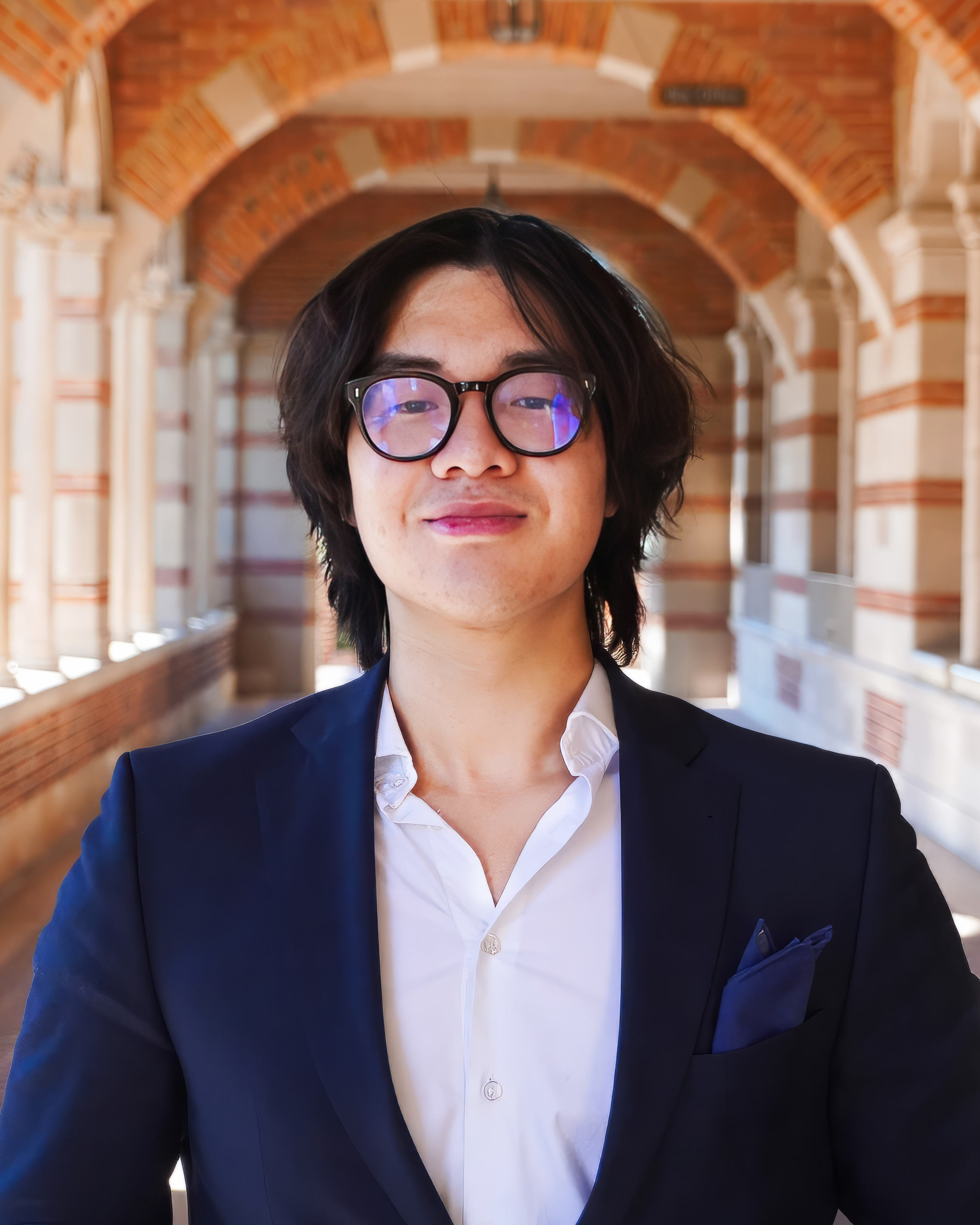 A man wearing a blue suit