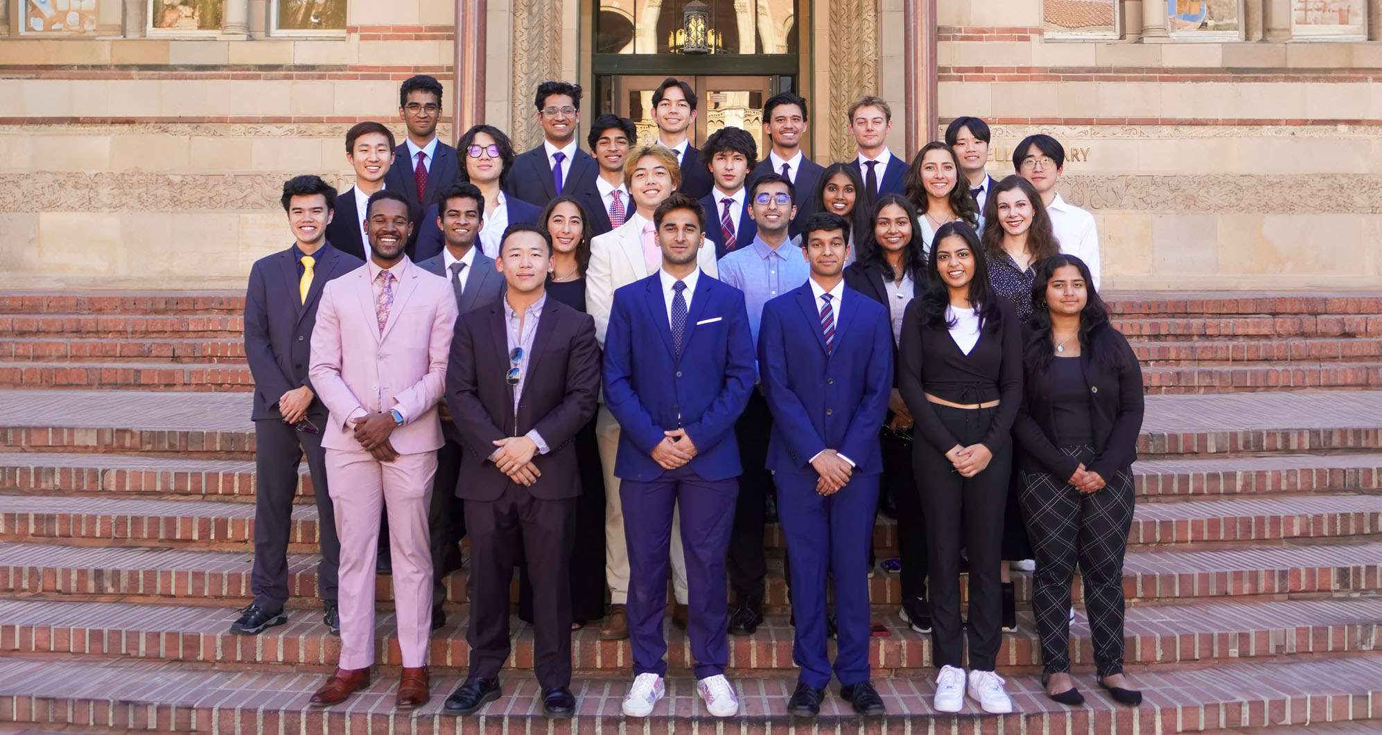 Group of UCLA students dressed in formal attire
