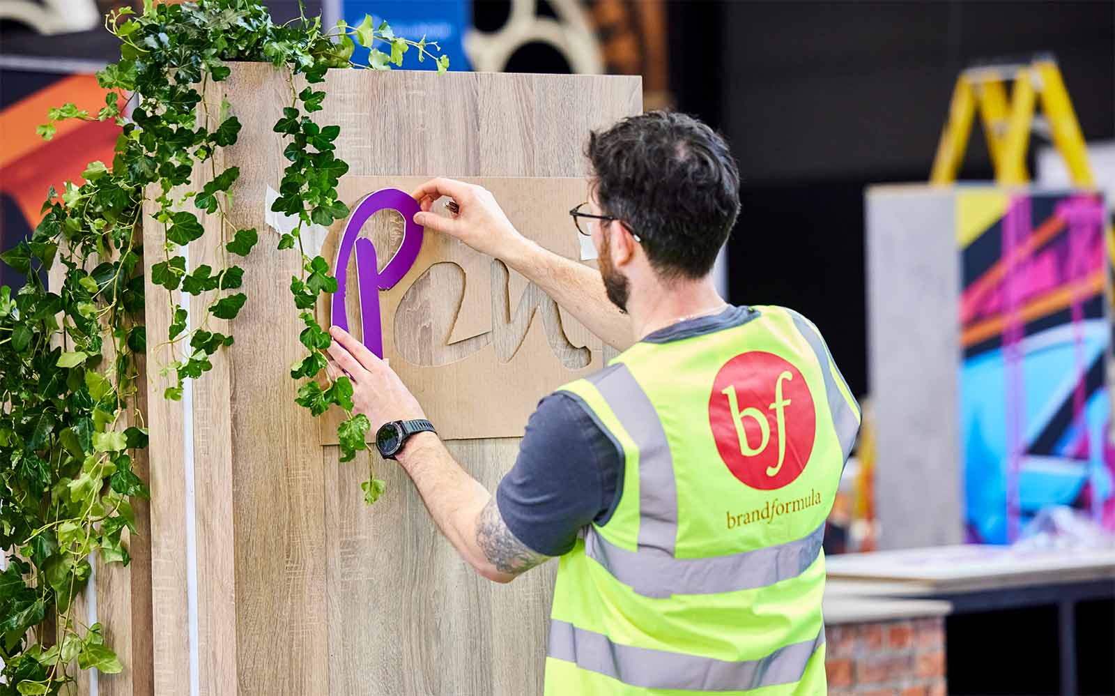 Signage being aligned on a conference stand