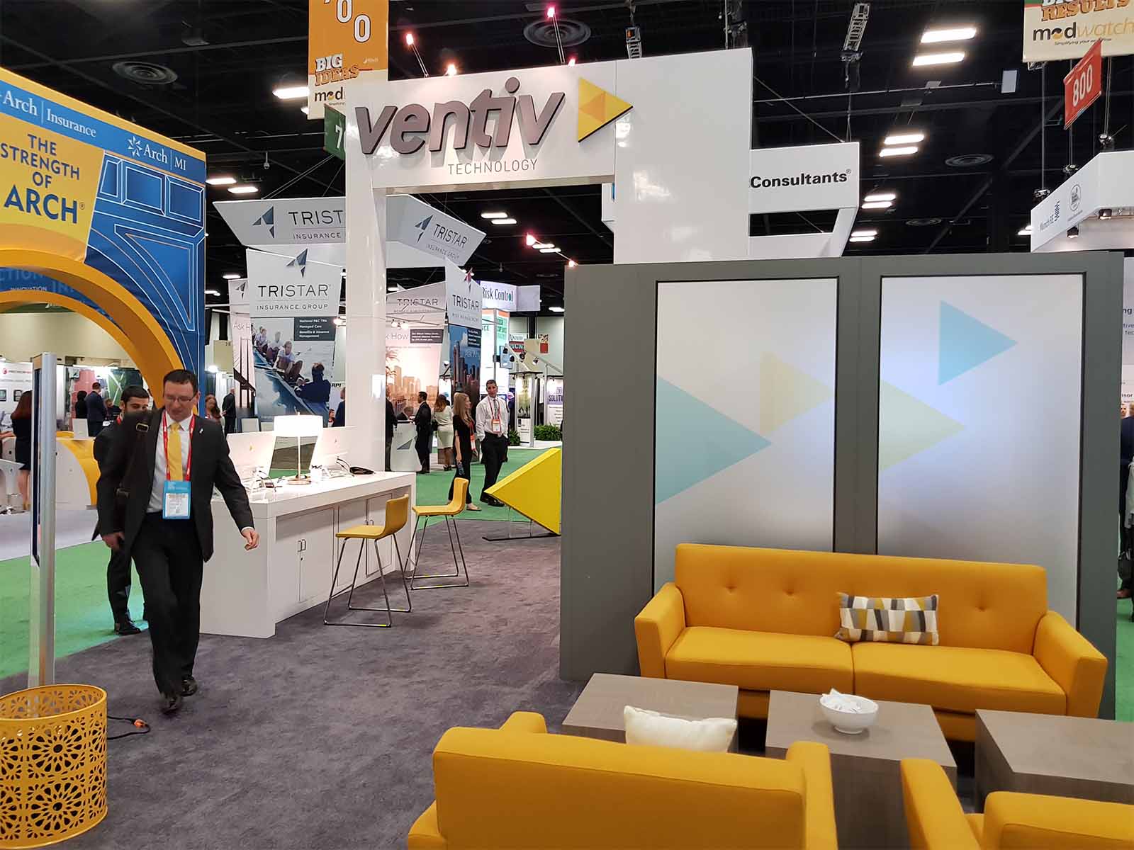 Signage being attached to a conference stand