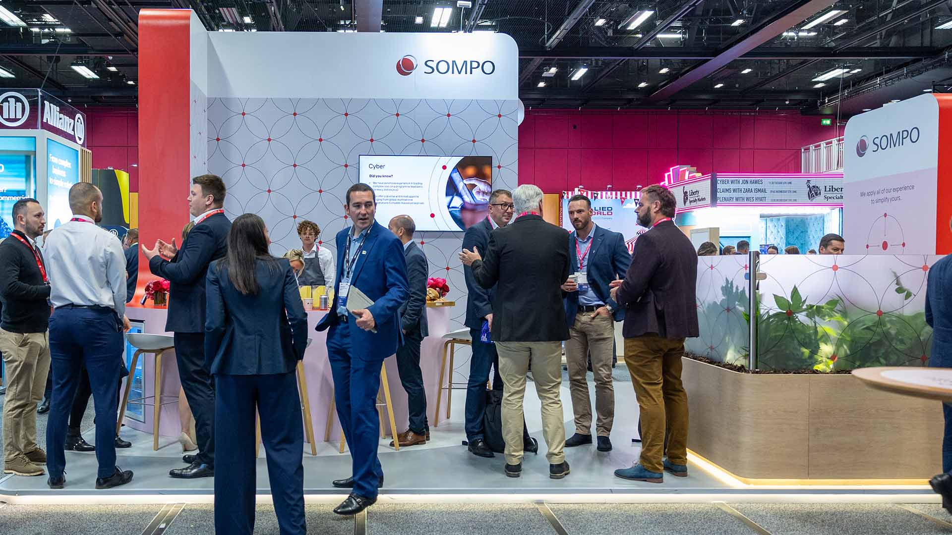 People networking and having discussions on a conference stand