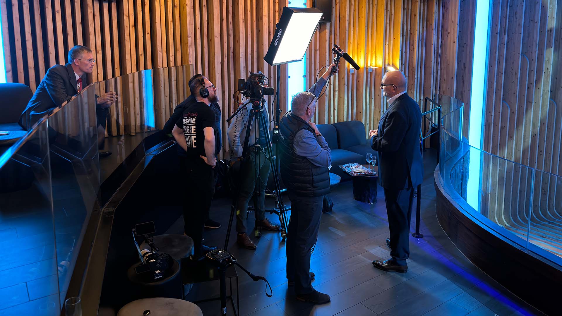 Signage being aligned on a conference stand