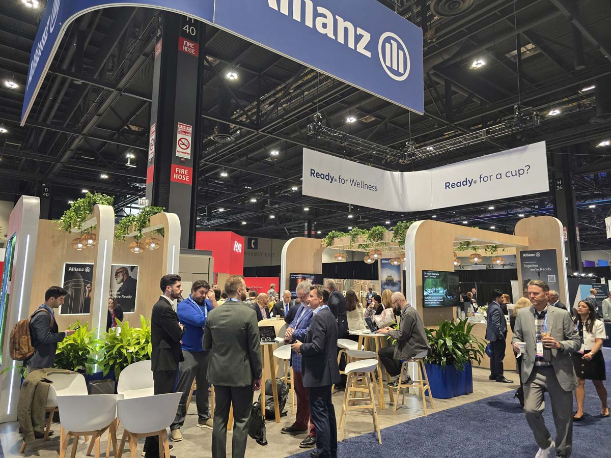 People networking and having discussions on a conference stand