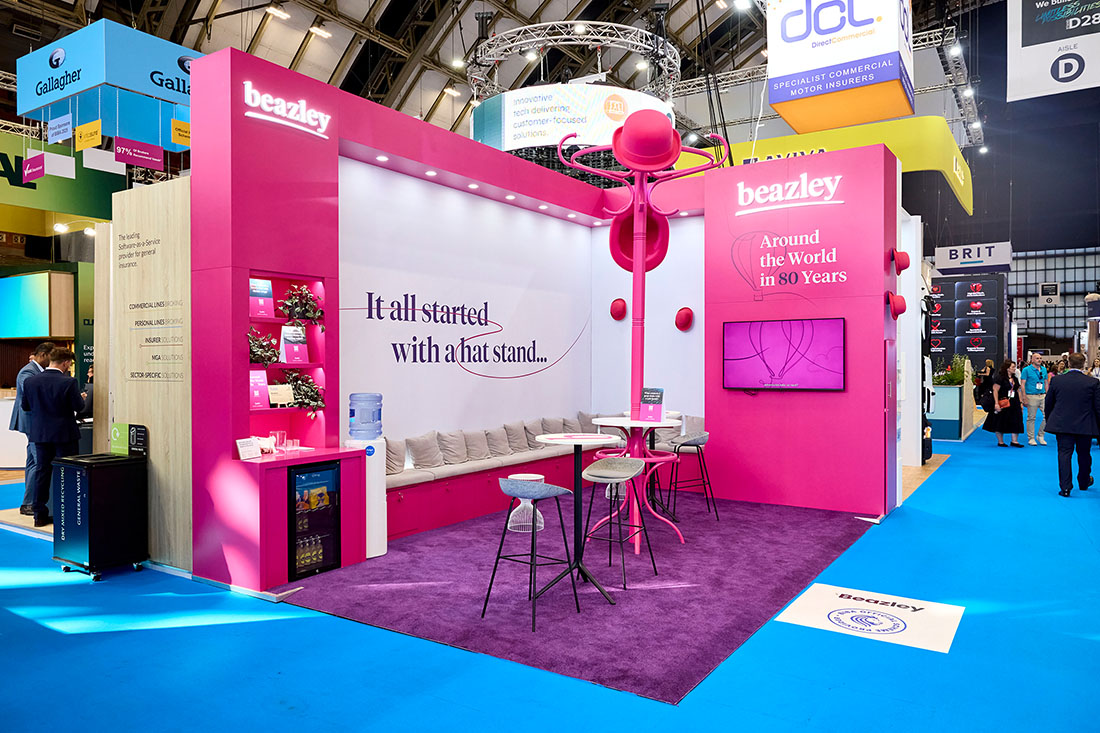 People networking and having discussions on a conference stand
