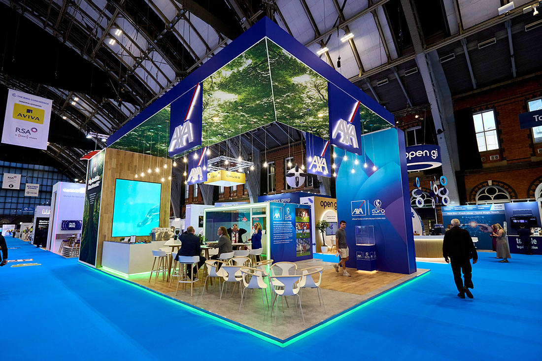 People networking and having discussions on a conference stand