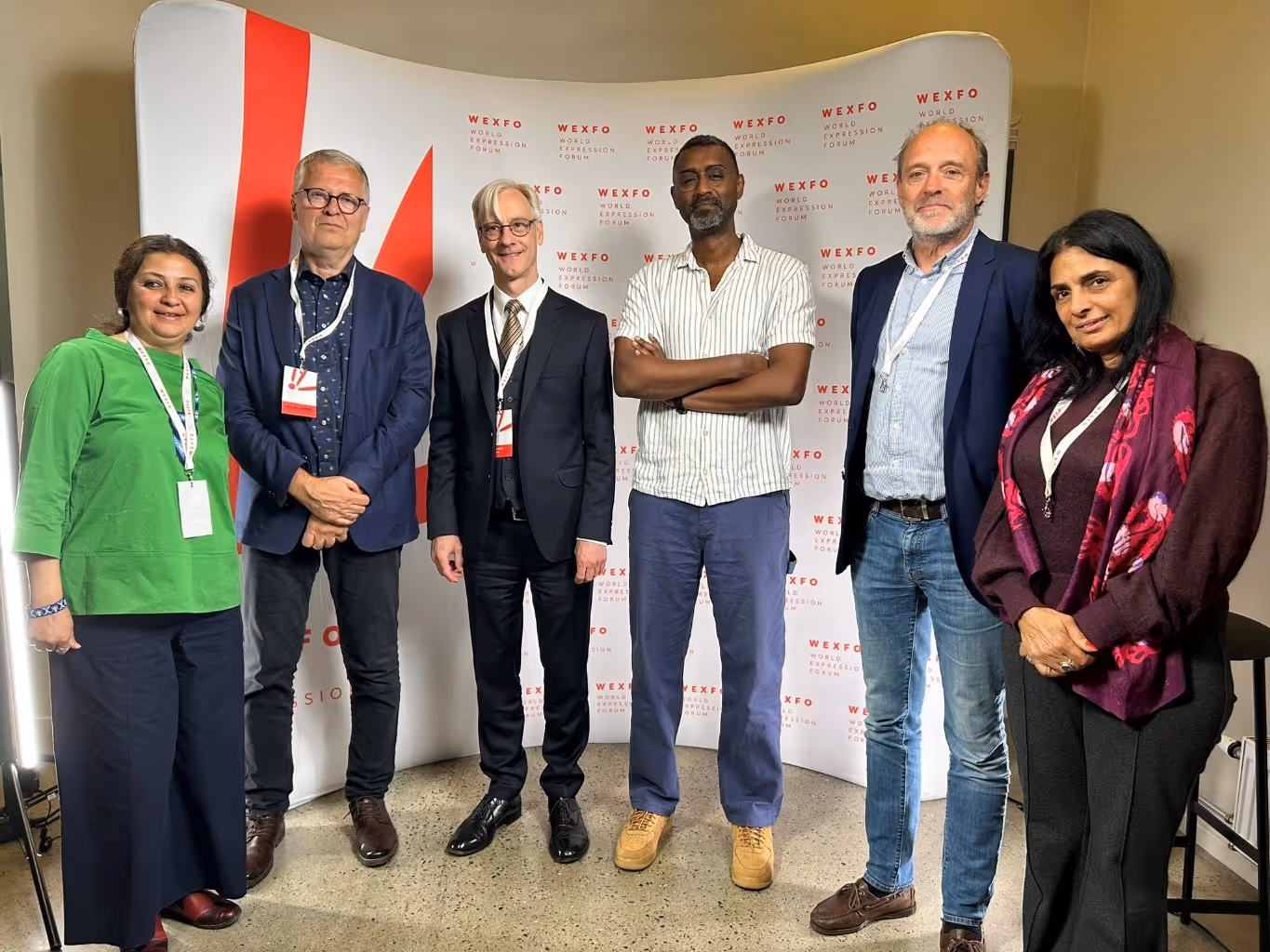 Khalid Albaih and Helge Lunde, together with representatives from Mimeta, Action for Hope, and the Norwegian Ministry for Foreign Affairs. Photo: Erling Rimestad, Twitter.