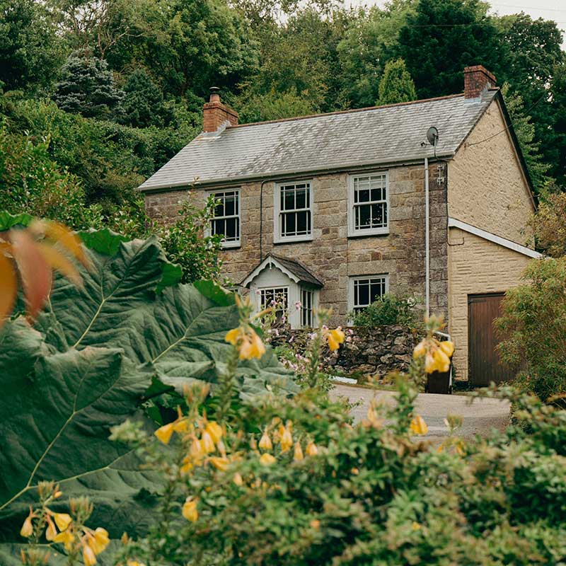 old restored stone house on a hill in osterley