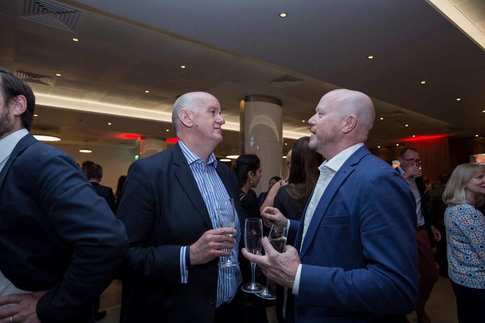 Executive Directors Hux & Neil deep in conversation with 3 glasses of champagne between 2?!