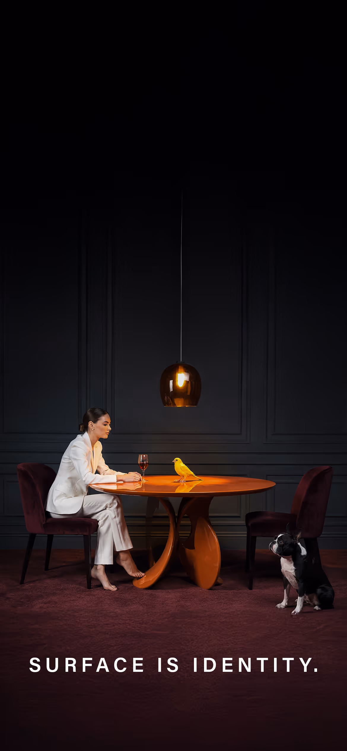 Luxury interior with glossy and matte surface finishes on designer table highlighting color depth and material identity in contemporary design