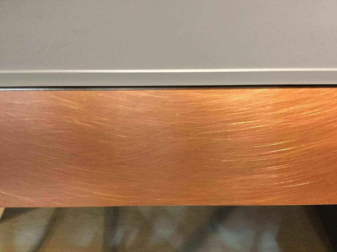 MOLTENI VERNICI special paints creating smooth copper-toned metallic surface