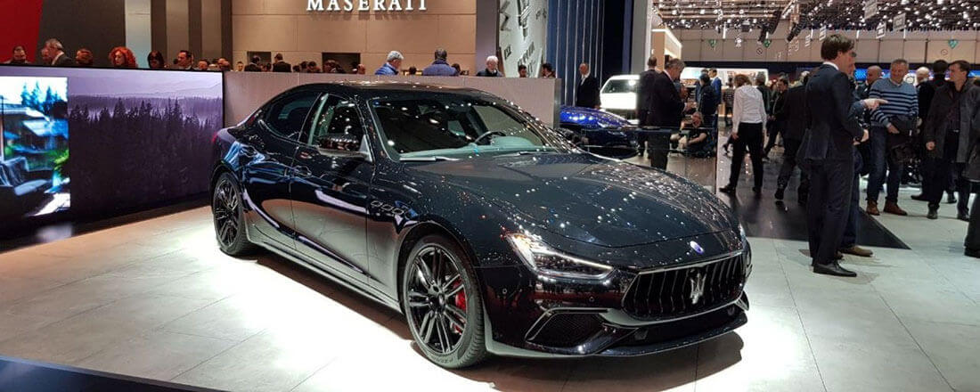 Sleek black Maserati with MOLTENI VERNICI special paints at auto show