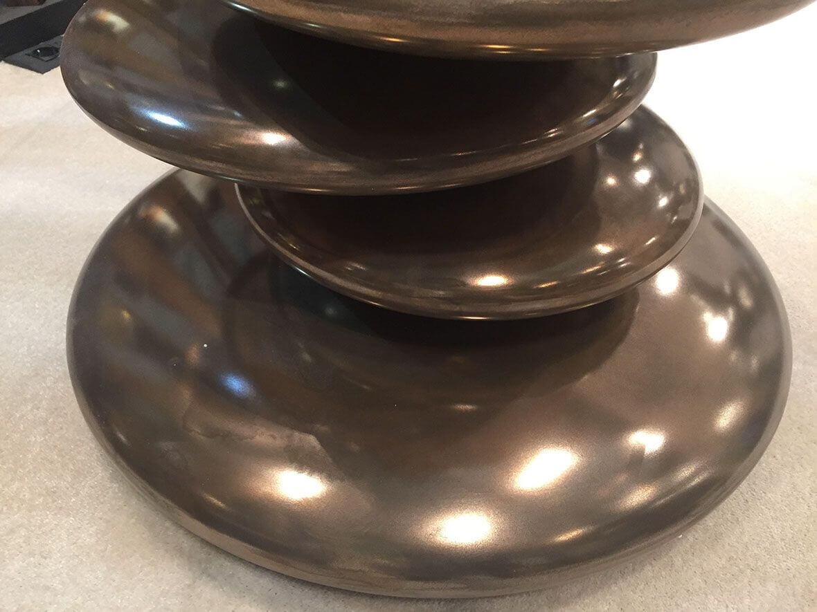 MOLTENI VERNICI special paints create glossy bronze-like metallic sculptural surface