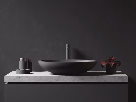 Lavabo grigio su piano in cemento con dettagli MOLTENI-VERNICI di verniciatura