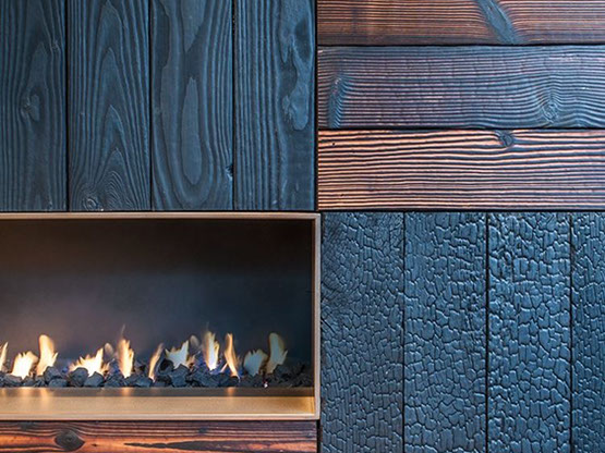 MOLTENI-VERNICI special paint effects showcase textured wood panels with fireplace