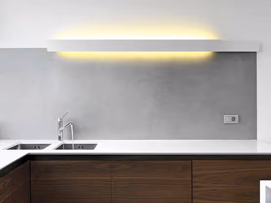 MOLTENI-VERNICI special paint effects create minimalist kitchen with glowing light