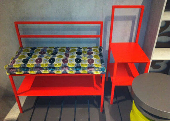 MOLTENI-VERNICI fluo paint vibrant red metal bench with colorful geometric cushion