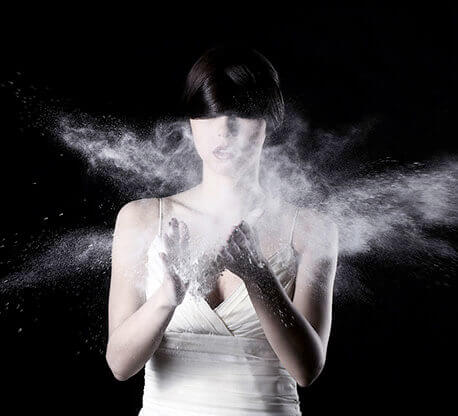 MOLTENI-VERNICI paint effect: Woman dissolving in white powder burst