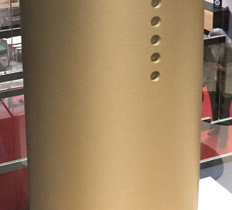 MOLTENI-VERNICI diamond paint finish on golden cylindrical surface with perforations