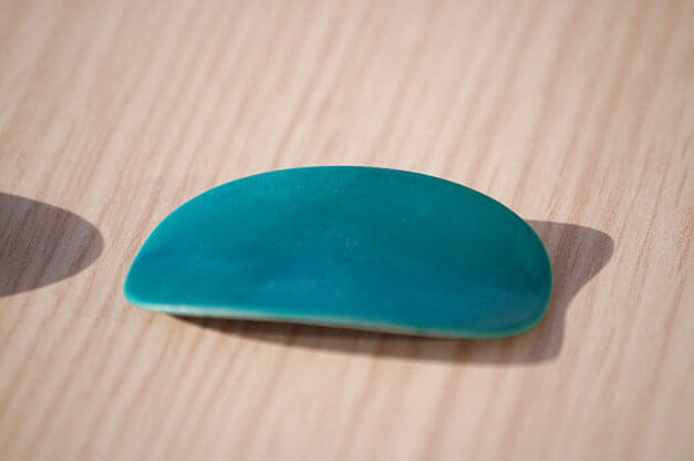 MOLTENI-VERNICI special oxidation paint effect creates teal smooth curved object