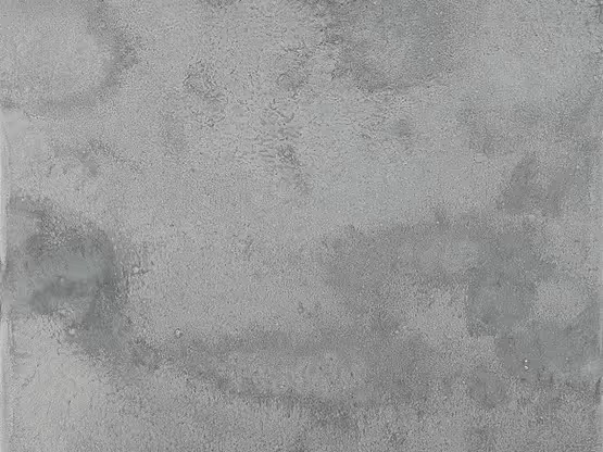 Acabados especiales MOLTENI-VERNICI con textura de cemento gris desgastado