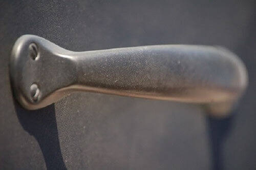MOLTENI-VERNICI special oxidation paint effect on sleek metallic door handle