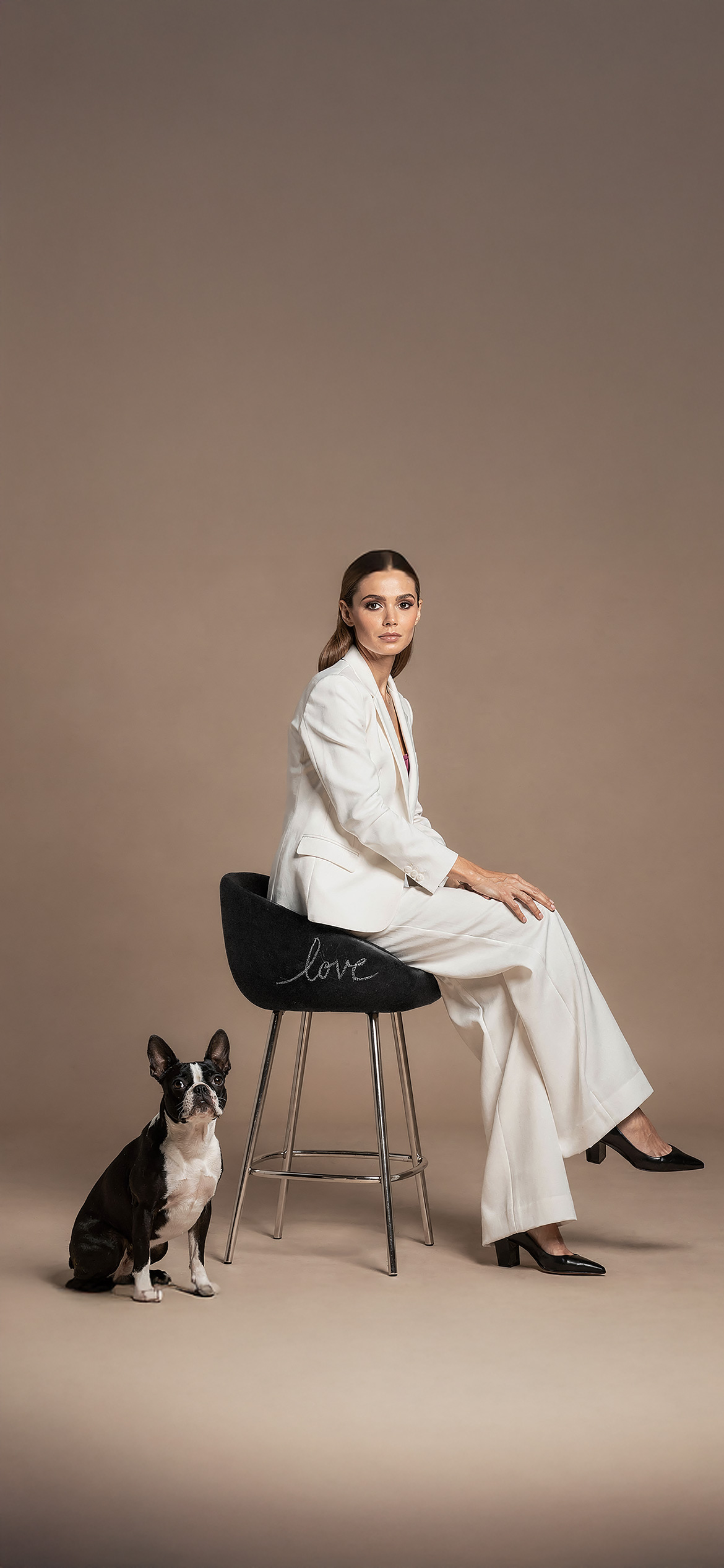 Luxury architectural metal finish by Molteni Vernici applied on a sculptural brass table surface in a contemporary interior.