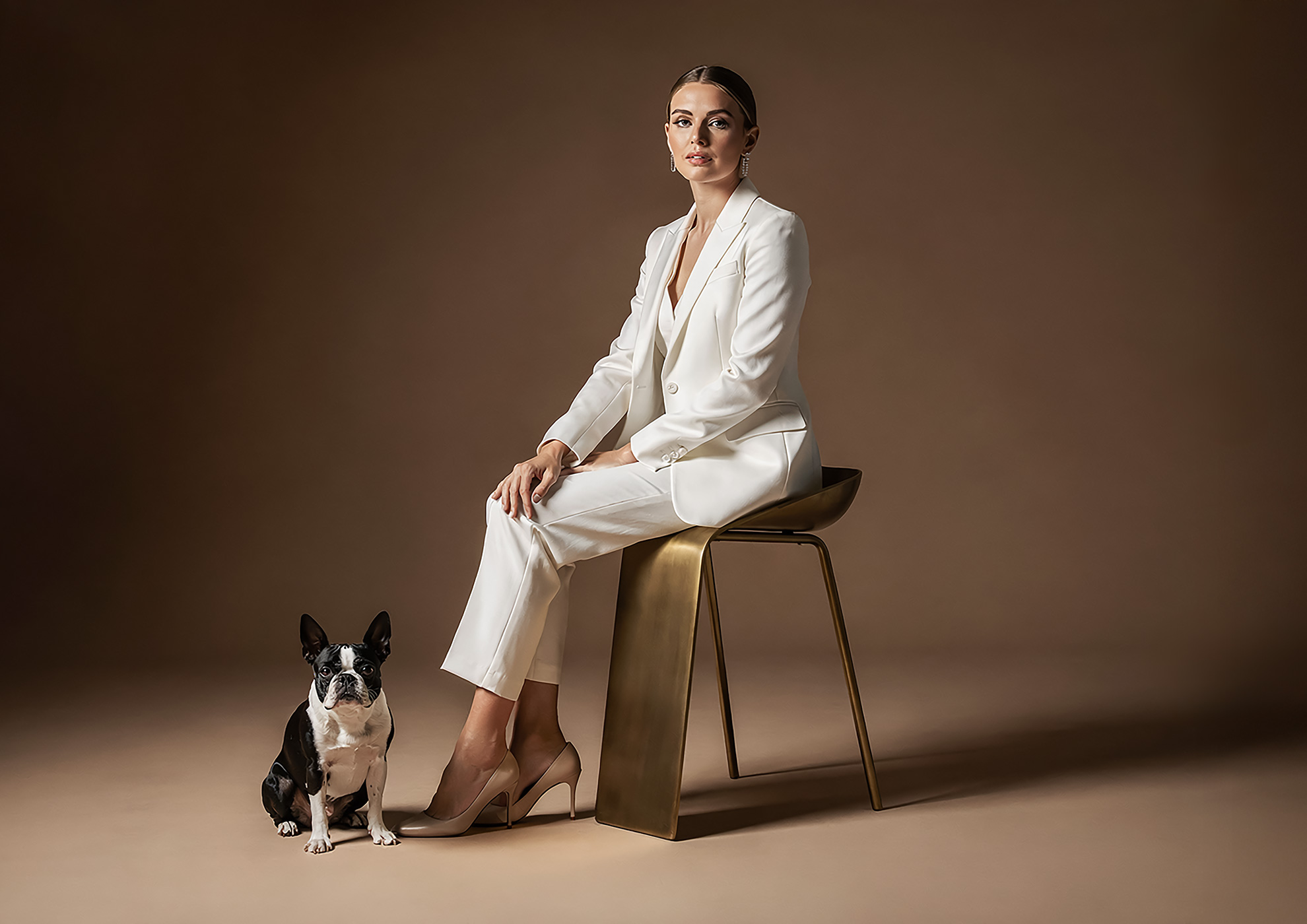 Minimalist architectural scene with a woman in a black couture dress standing on a reflective surface, expressing Molteni Vernici’s approach to special paints, advanced surface technologies, and design-driven material innovation.