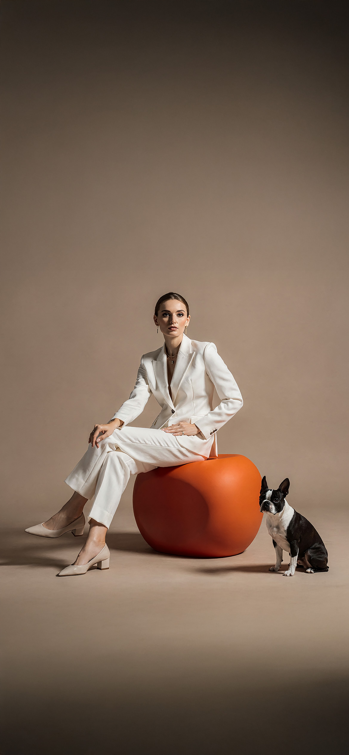 Luxury architectural metal finish by Molteni Vernici applied on a sculptural brass table surface in a contemporary interior.