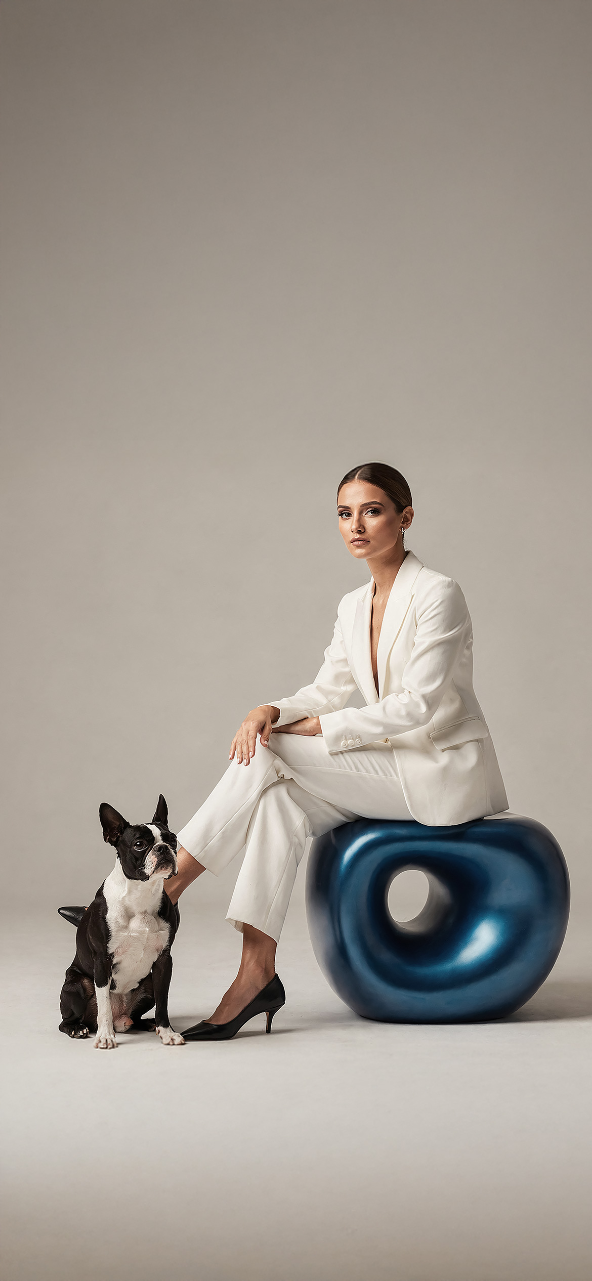 Luxury architectural metal finish by Molteni Vernici applied on a sculptural brass table surface in a contemporary interior.