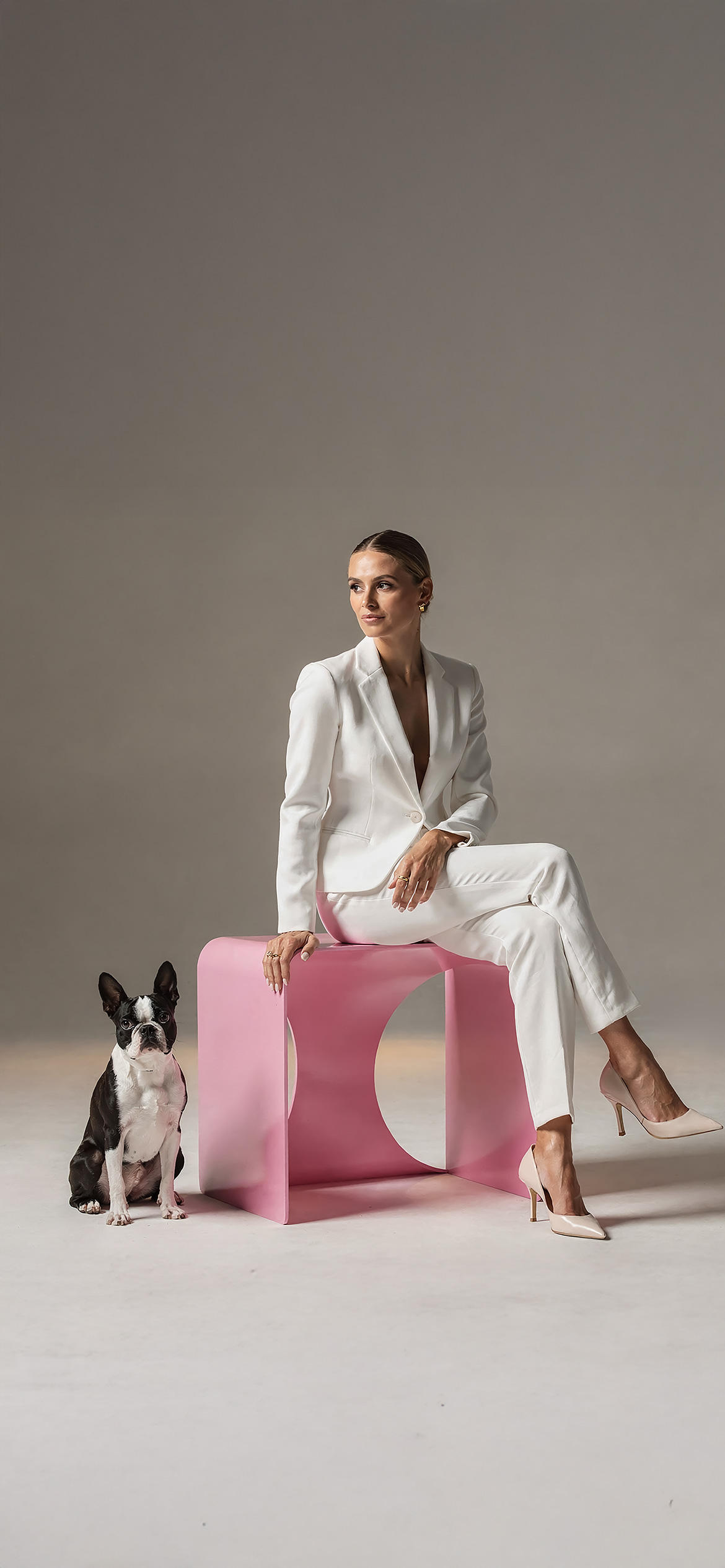 Luxury architectural metal finish by Molteni Vernici applied on a sculptural brass table surface in a contemporary interior.