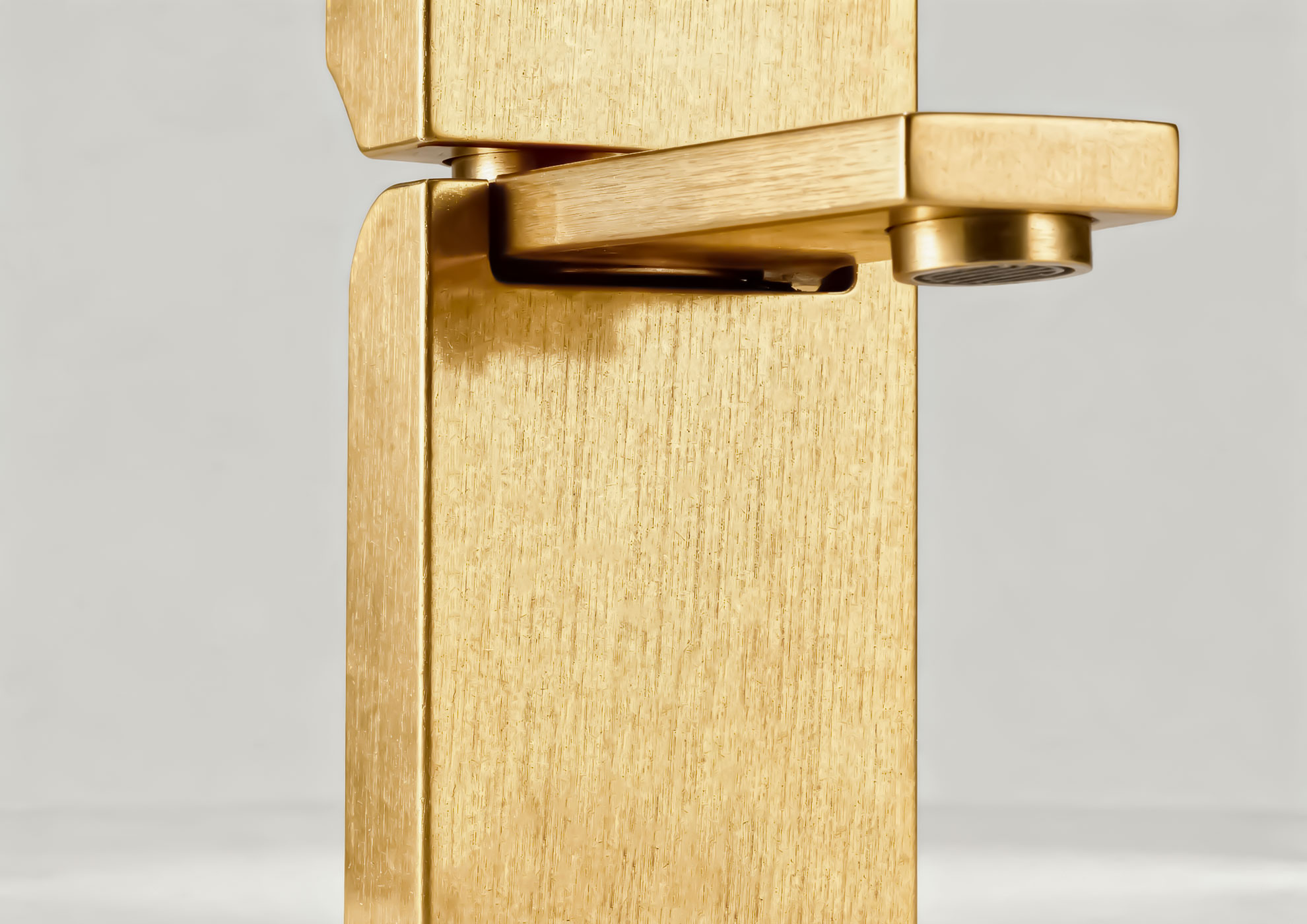 Architectural faucet in brushed gold metal with Never Brushed Molteni Vernici finish, premium decorative surface for contemporary luxury bathroom design made in Italy.