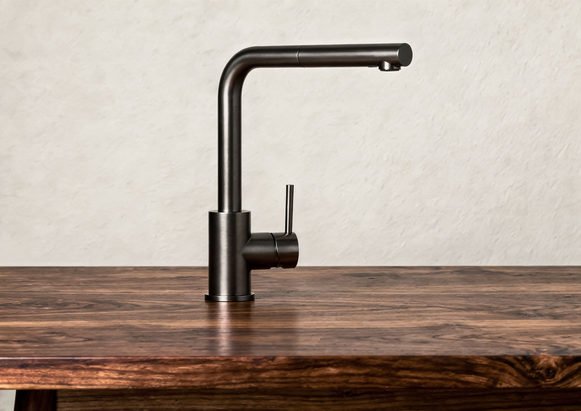 Minimalist design faucet with Never Brushed brushed metal finish by Molteni Vernici, luxury decorative surface applied on steel base for prestigious contemporary bathroom furnishings.
