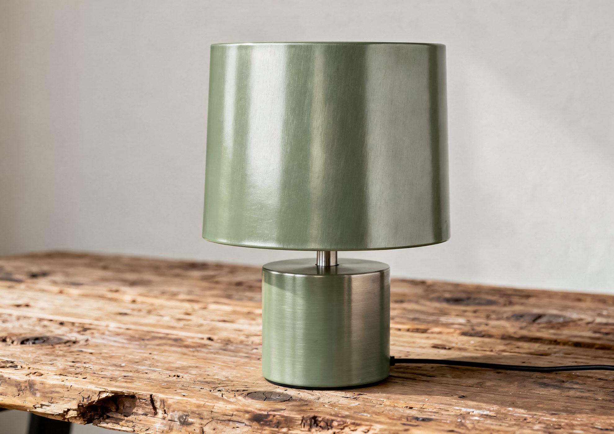 Design table lamp with base and lampshade in brushed metal sage green finished with Never Brushed effect paint by Molteni Vernici, luxury decorative surface for contemporary interior lighting.
