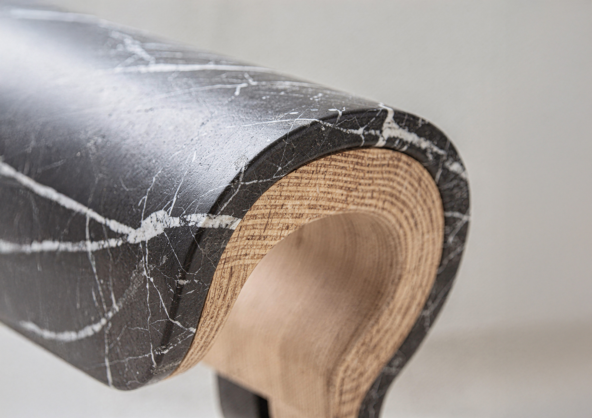 Close-up detail of STONAIR black marble surface.