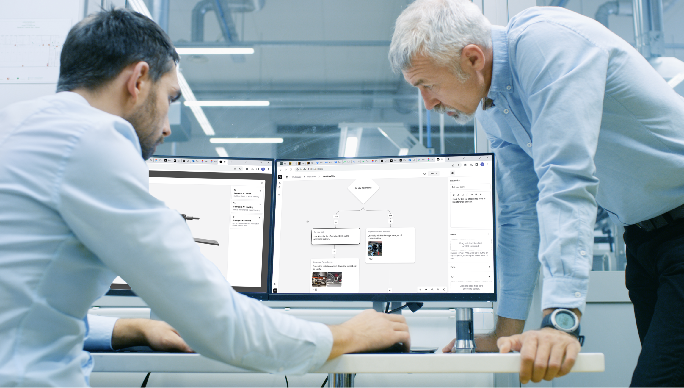 Two people digitalizing a standard operating procedure in front of a dual-screen desktop setup.