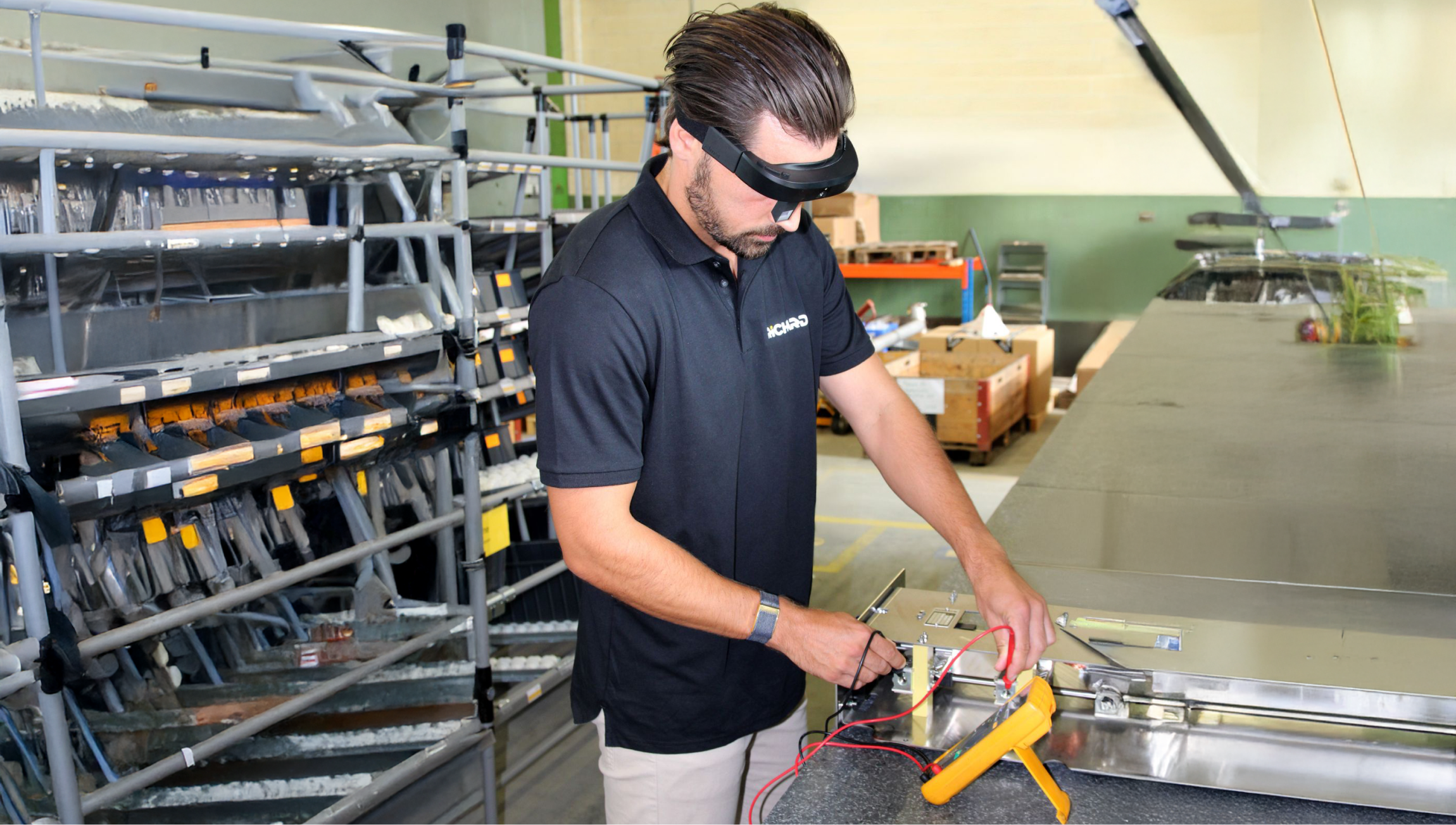 technician taking a video to capture a process with Almer headset.