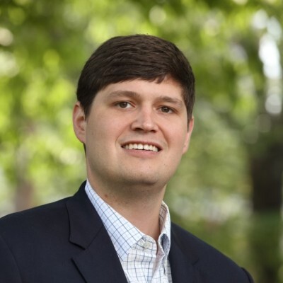 Headshot of Tommy, speaker in this Tropic session on introducing purchase prep