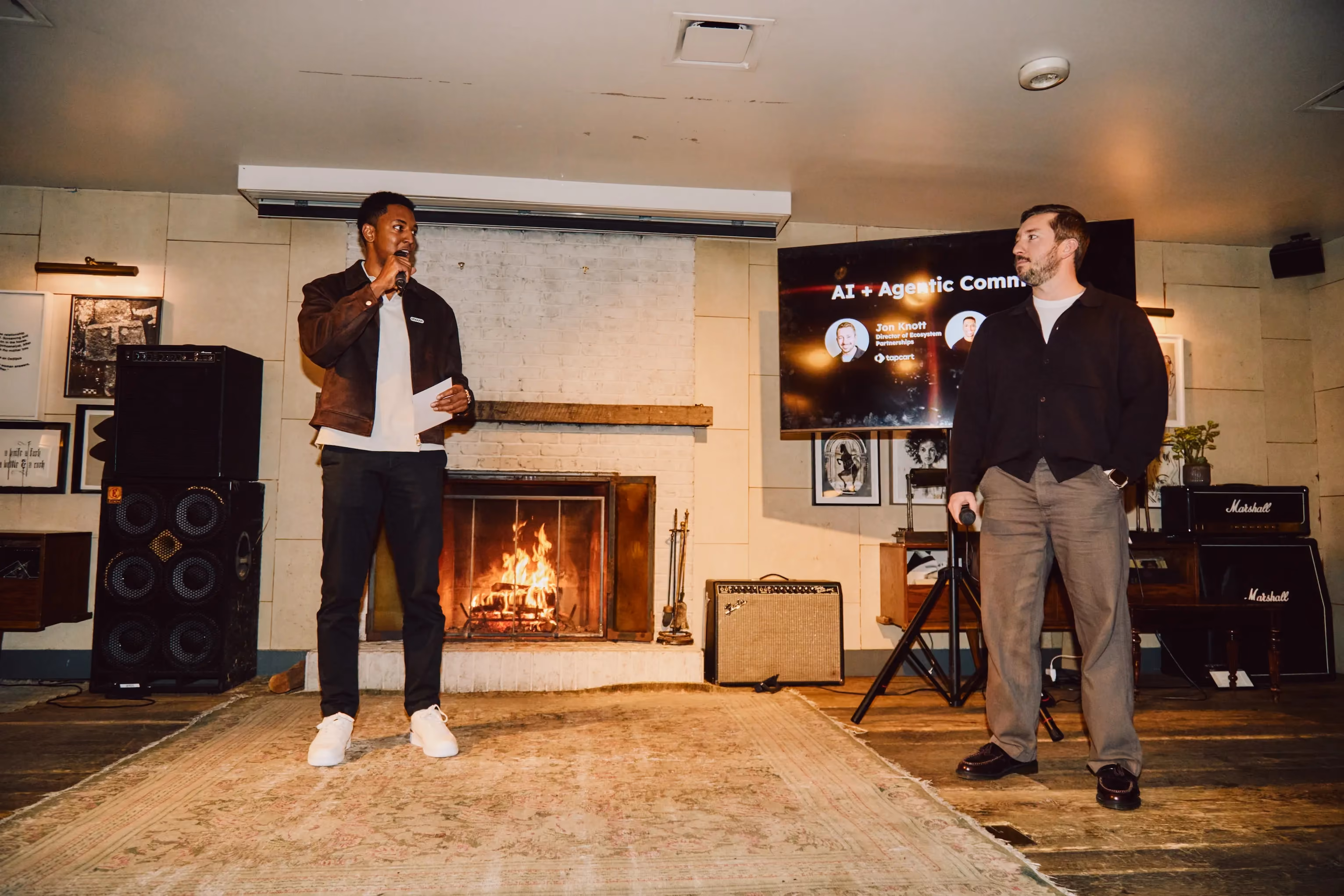 Two men presenting on AI and agentic commerce to an audience at an ehouse team event.
