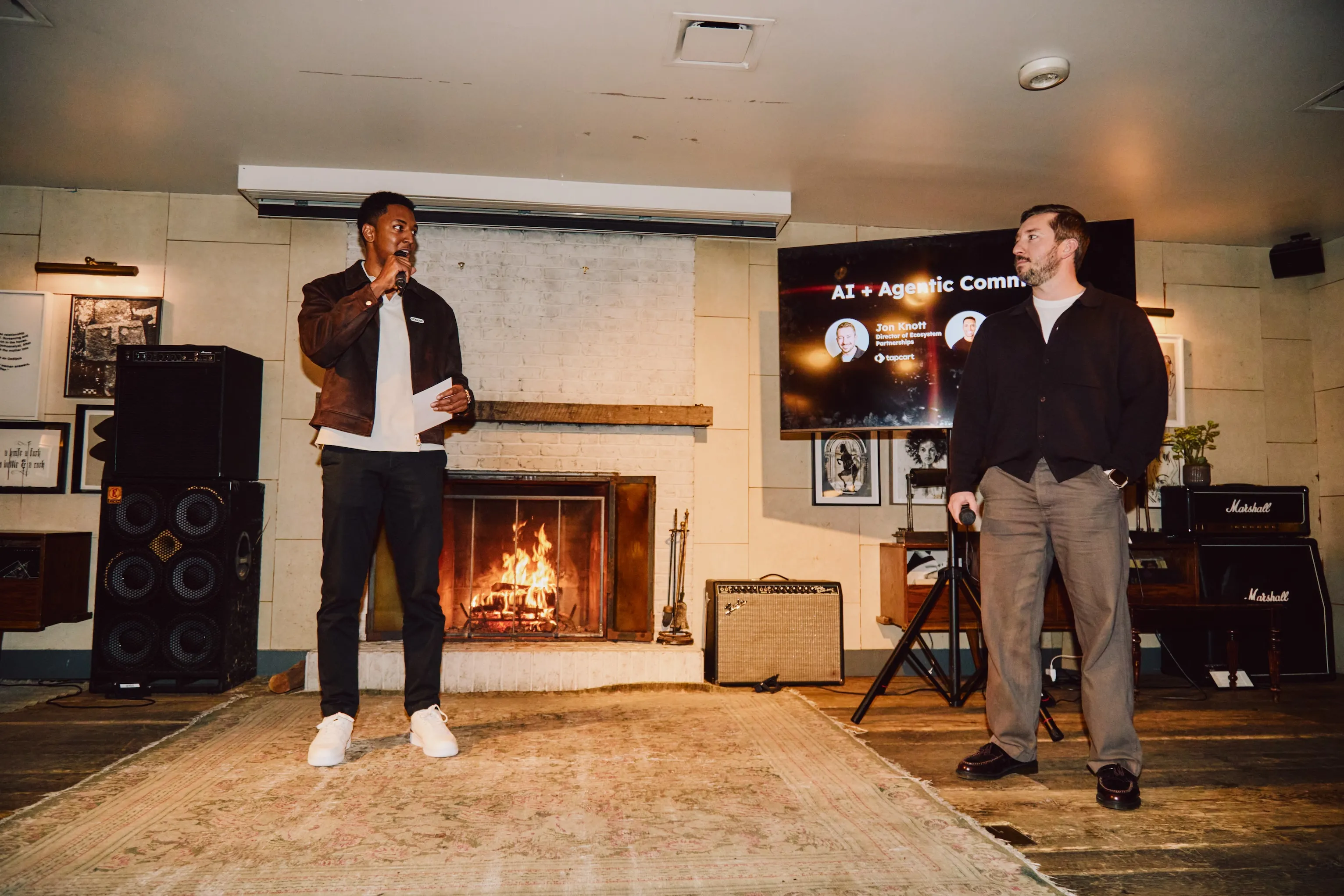 Two men presenting on AI and agentic commerce to an audience at an ehouse team event.