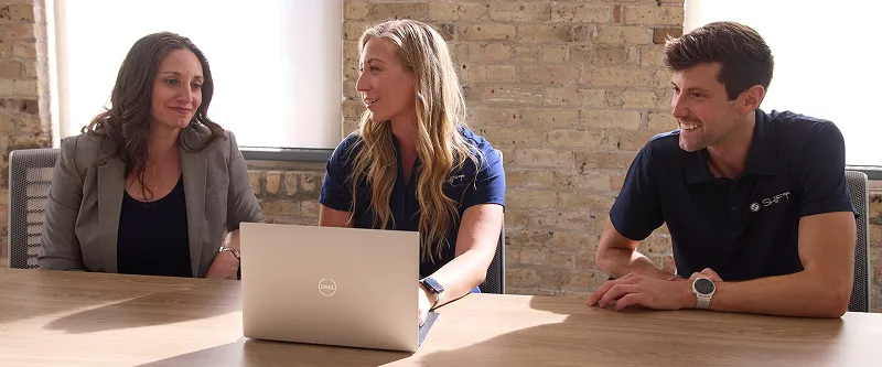 SHIFT executives in a meeting