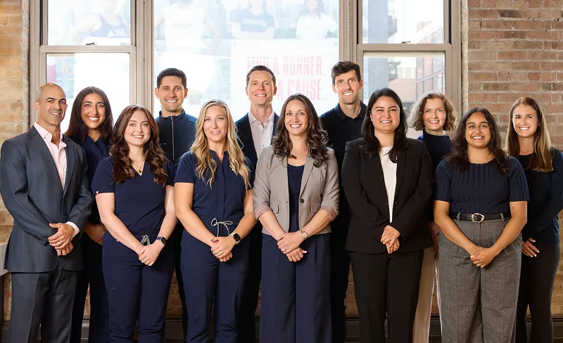 The team posing for a photo at Shift Health in Chicago, IL
